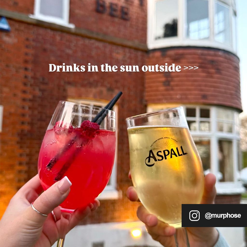 Two ciders clinking in the sun, by @murphose